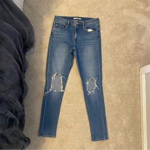 Ripped Levi’s 721 High Rise Skinny Jeans
